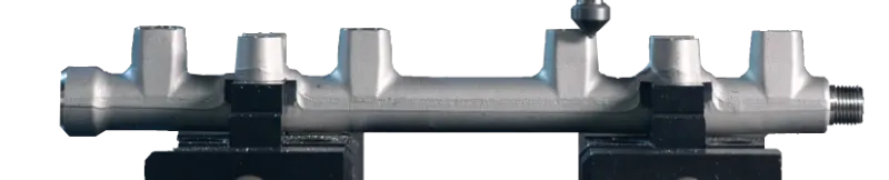 FDT AXIAL (F) deburring aluminium manifold — CNC machining centre application